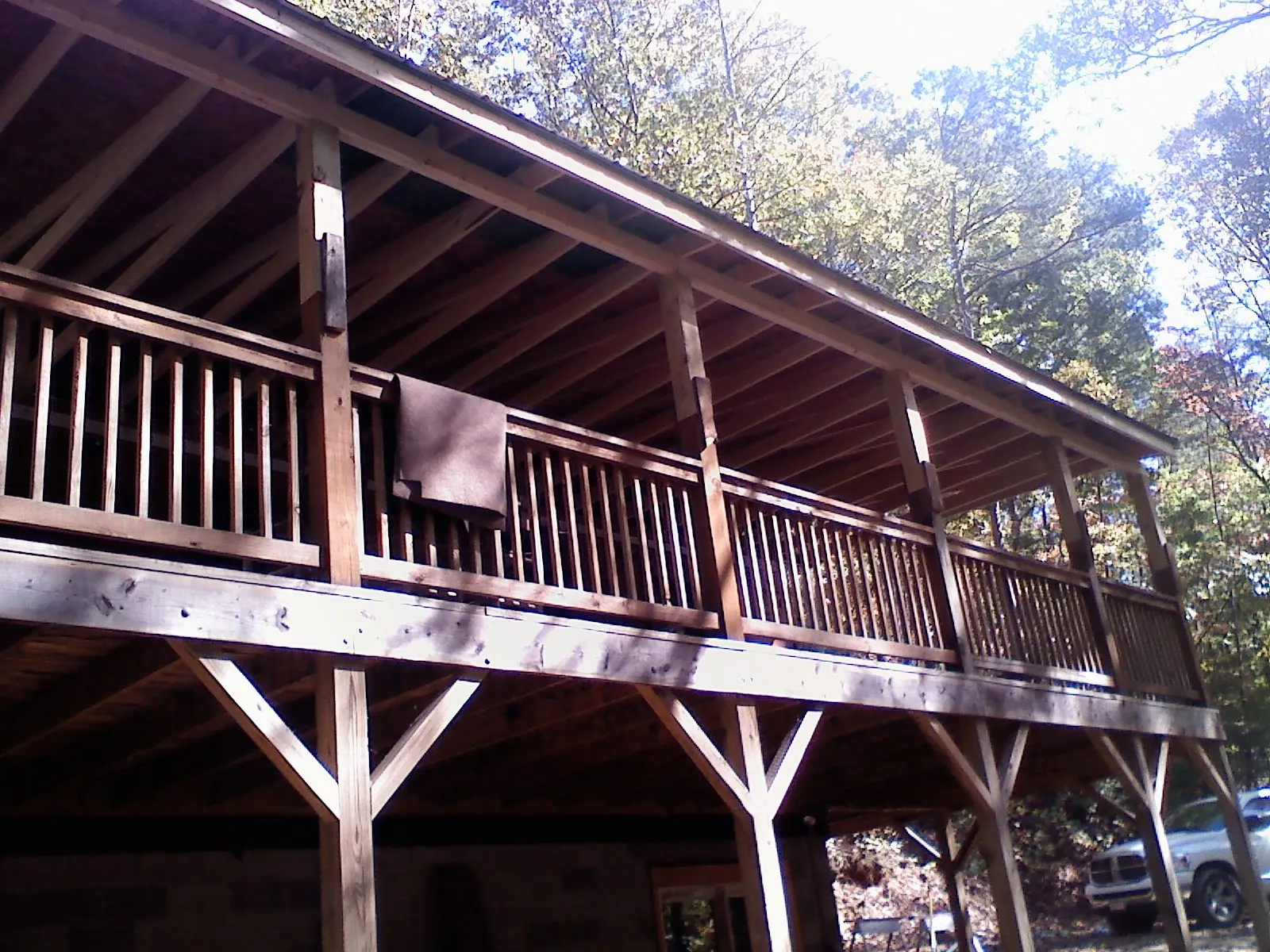 Timber framing under a new elevated porch and deck — Roof Leak Repair in Mc Gaheysville by Roofing Brothers